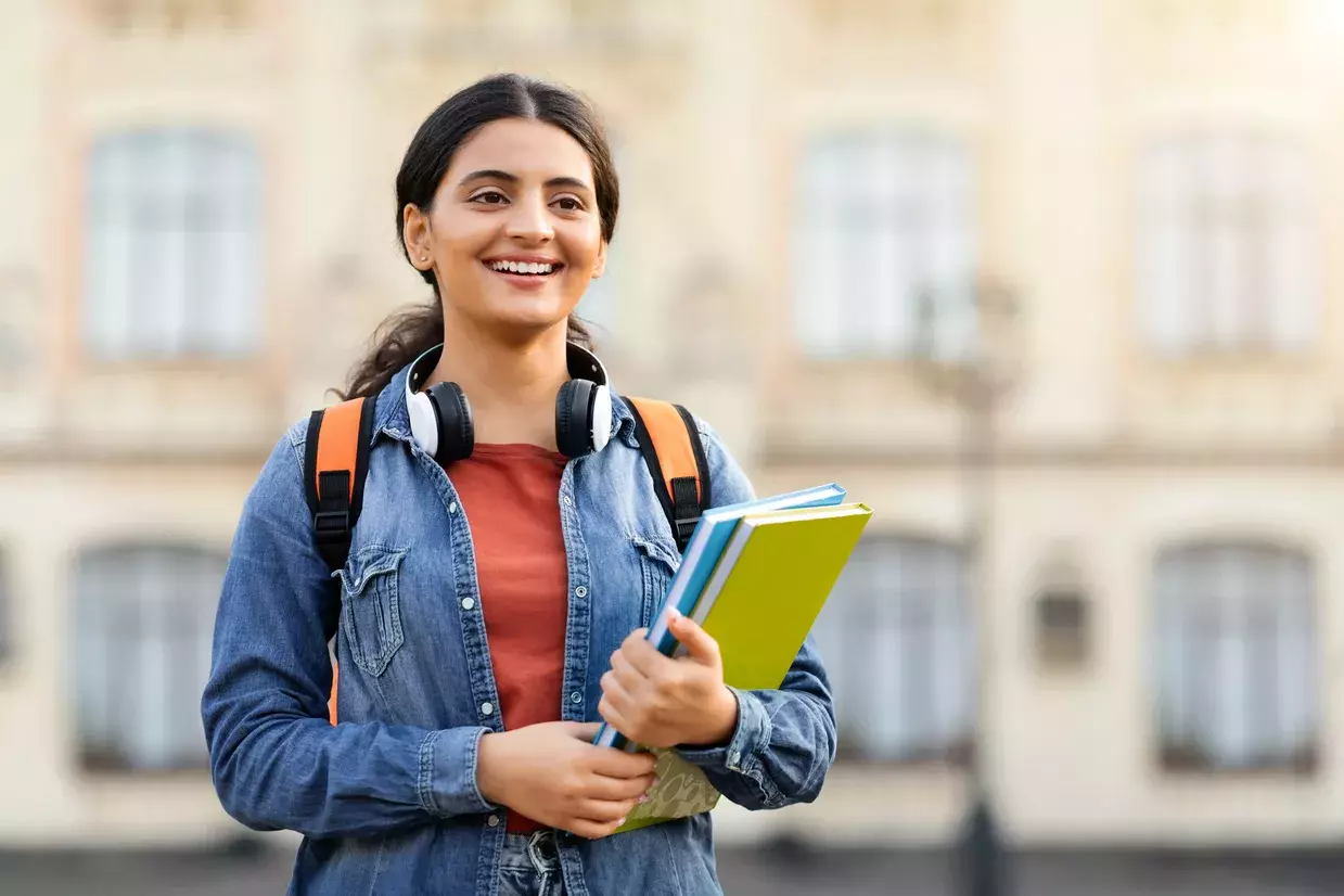 girl holding a book